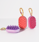 On the Go scalp massaging brush